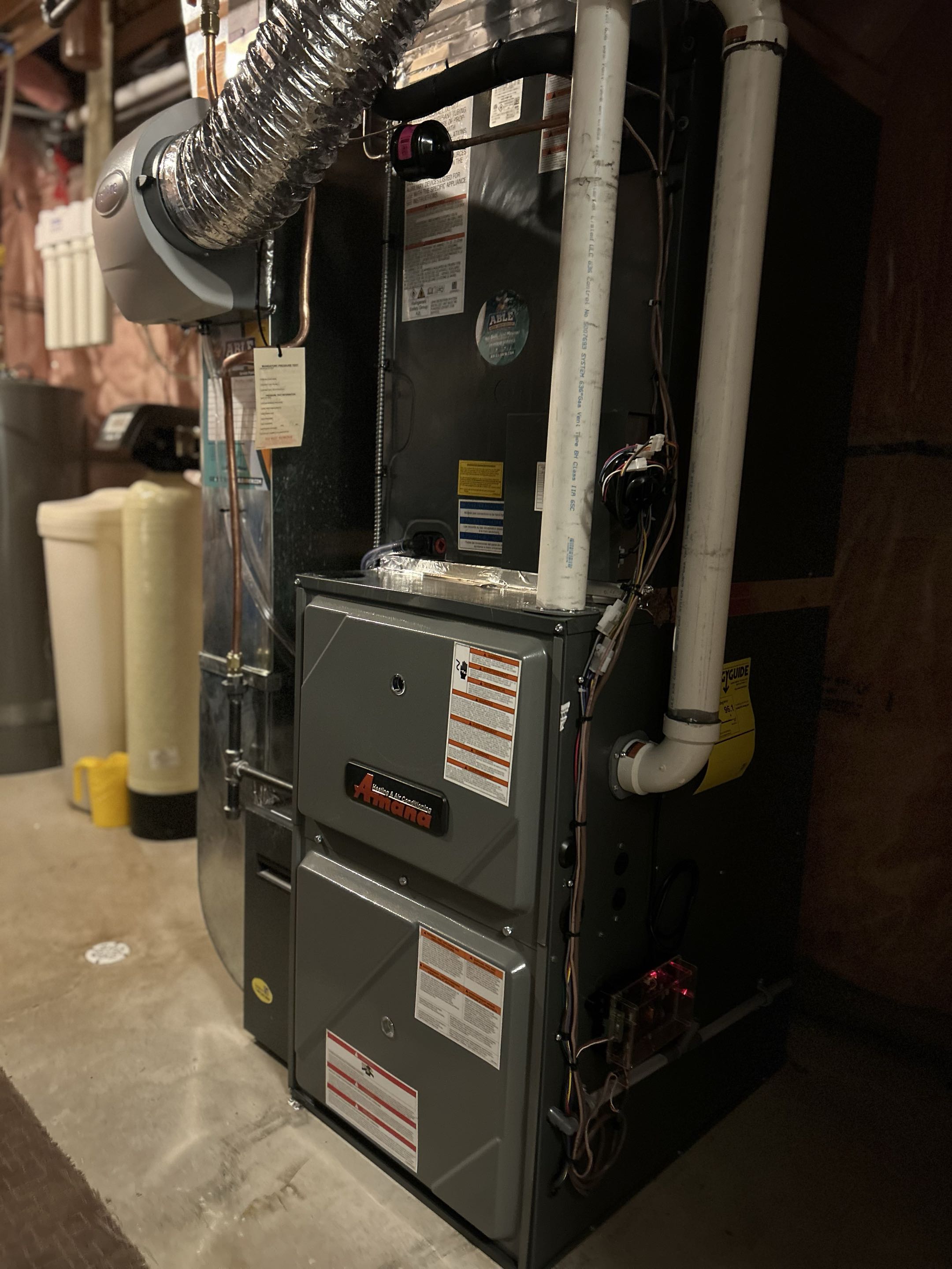 Completing an Amana furnace install for a family in Baden