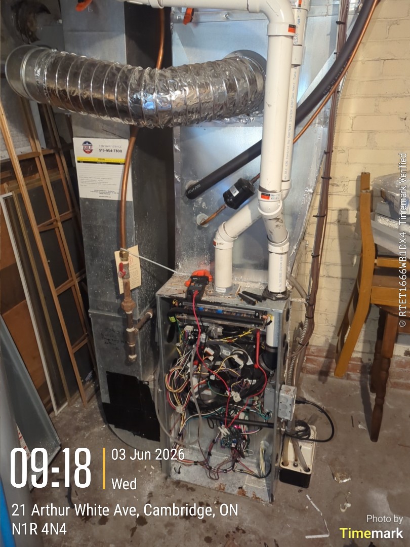 Completing a furnace and air conditioner tune-up for a family in Cambridge
