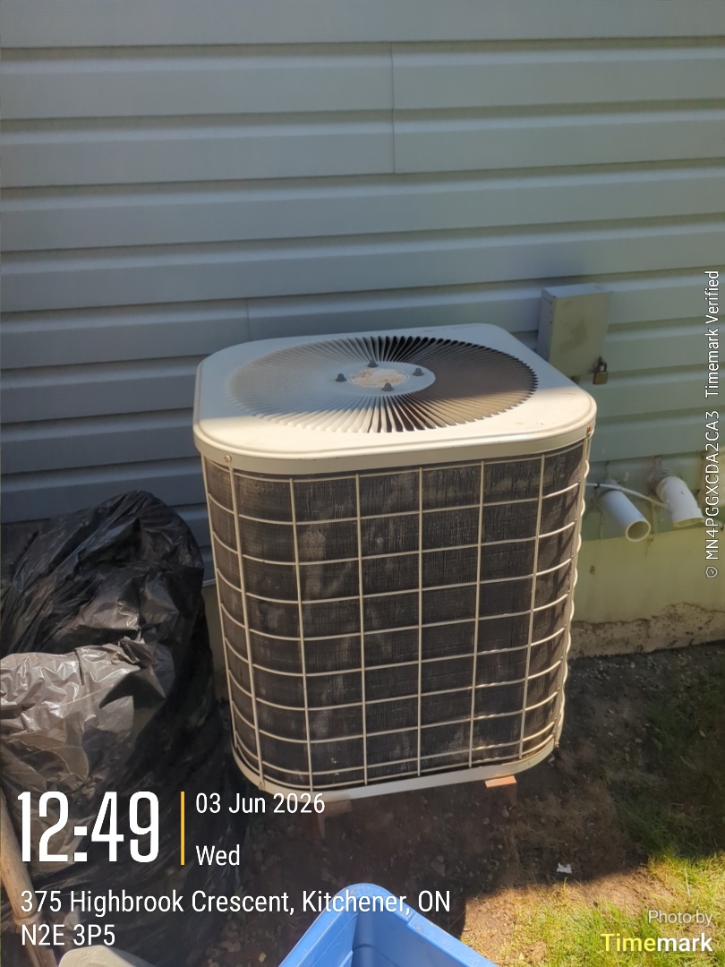 Completing an AC service call for a customer in the Williamsburg area of Kitchener