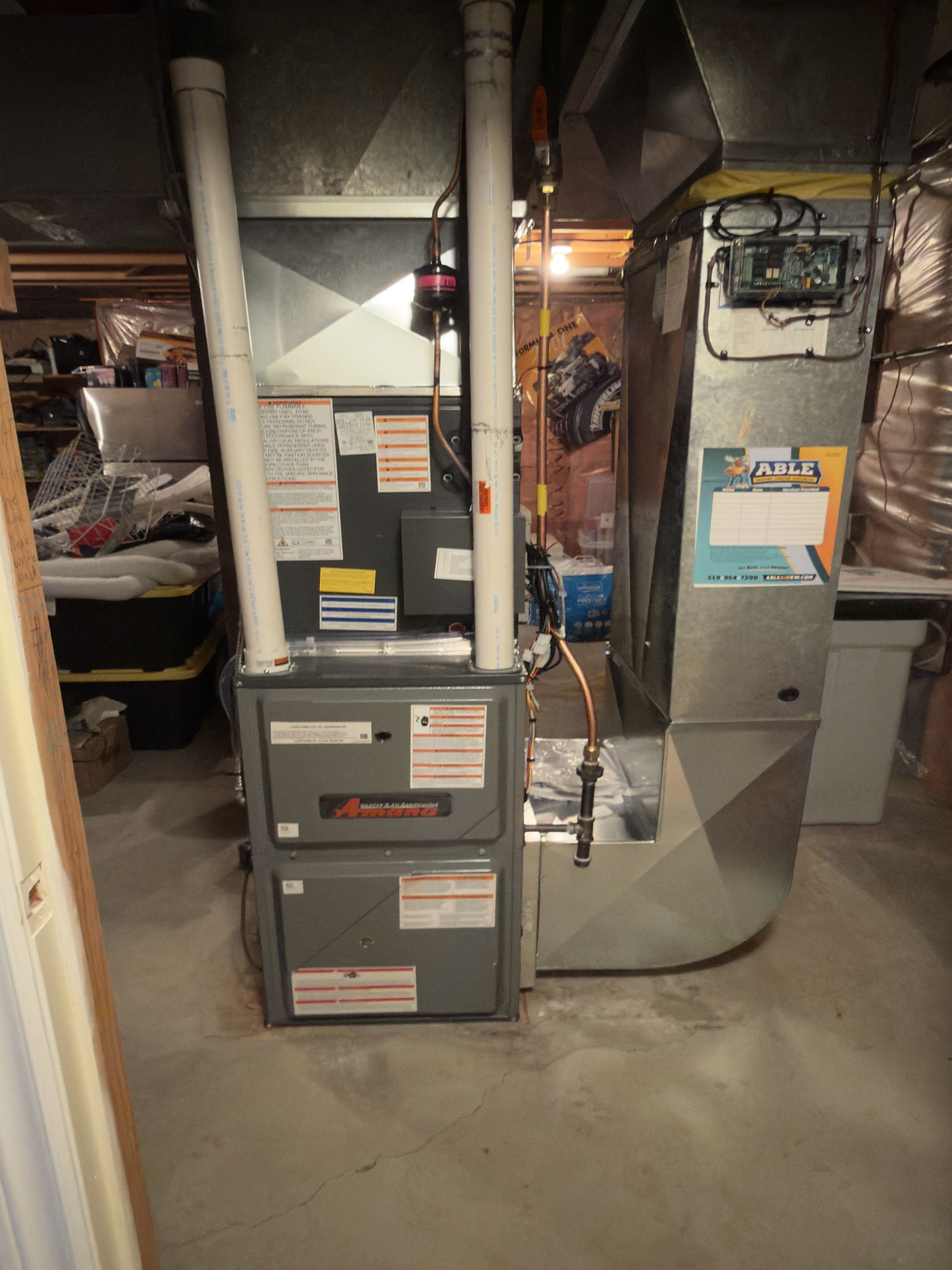 Completing an Amana Heat pump and furnace installation for a family in the Idlewood area of Kitchener
