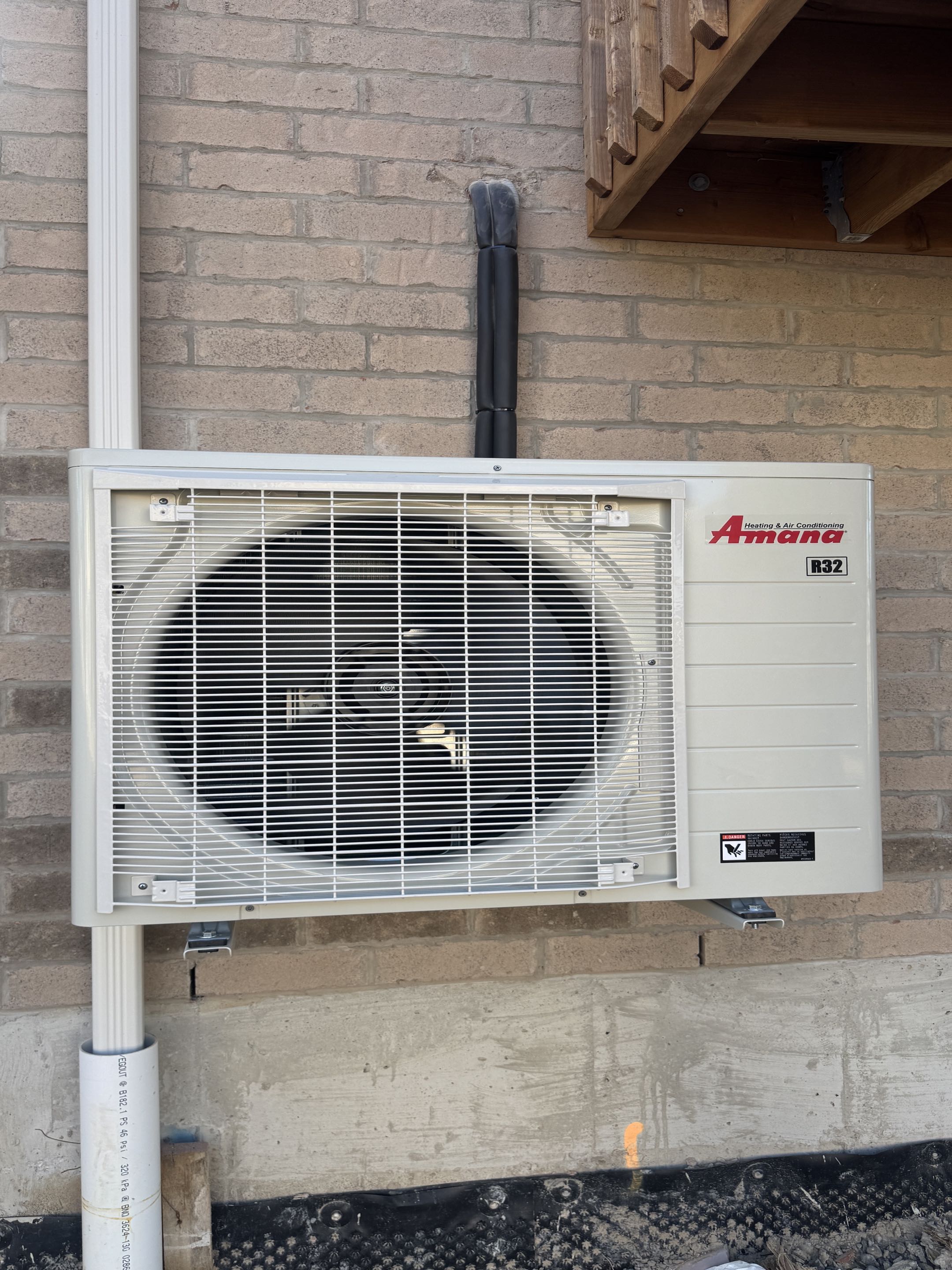 Completing an Amana Heat pump install for a family in the Williamsburg area of Kitchener