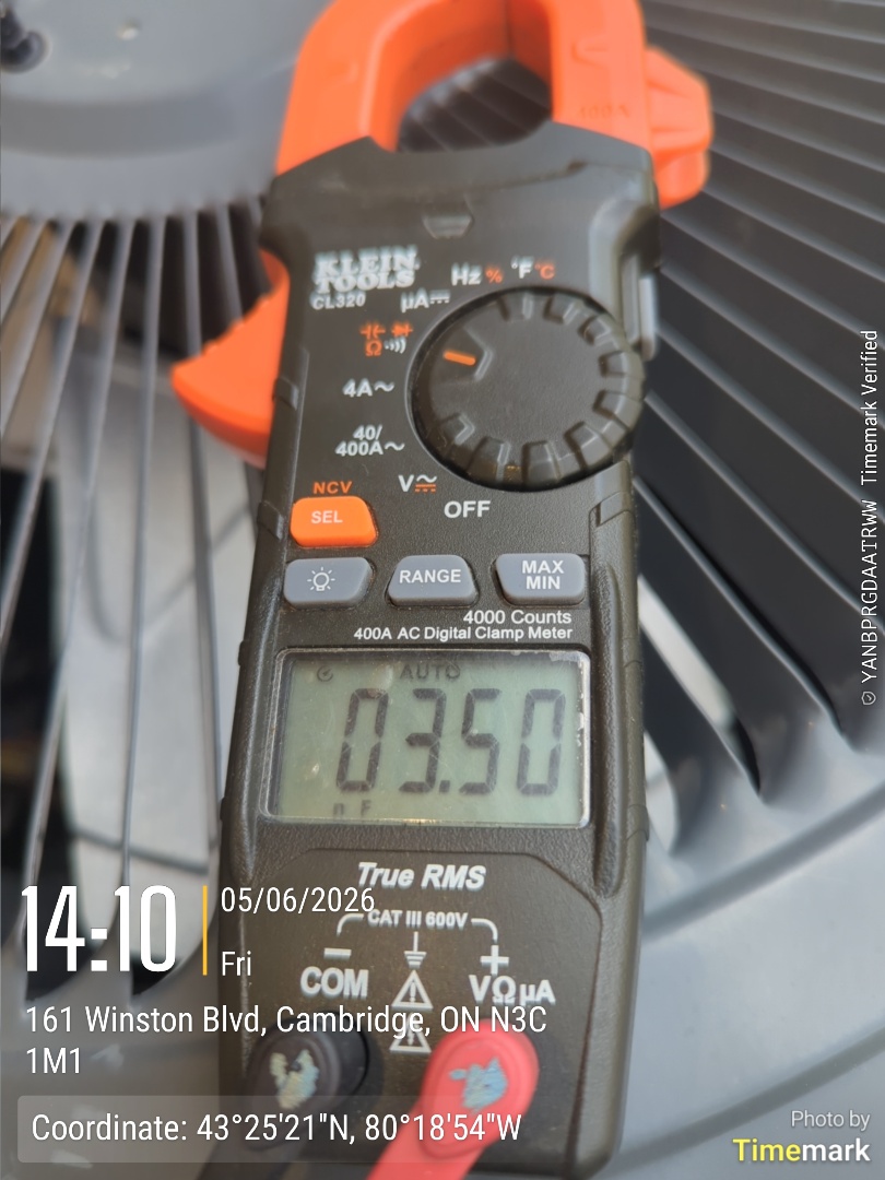 Completing a AC service call for a customer in Hespeler area of Cambridge