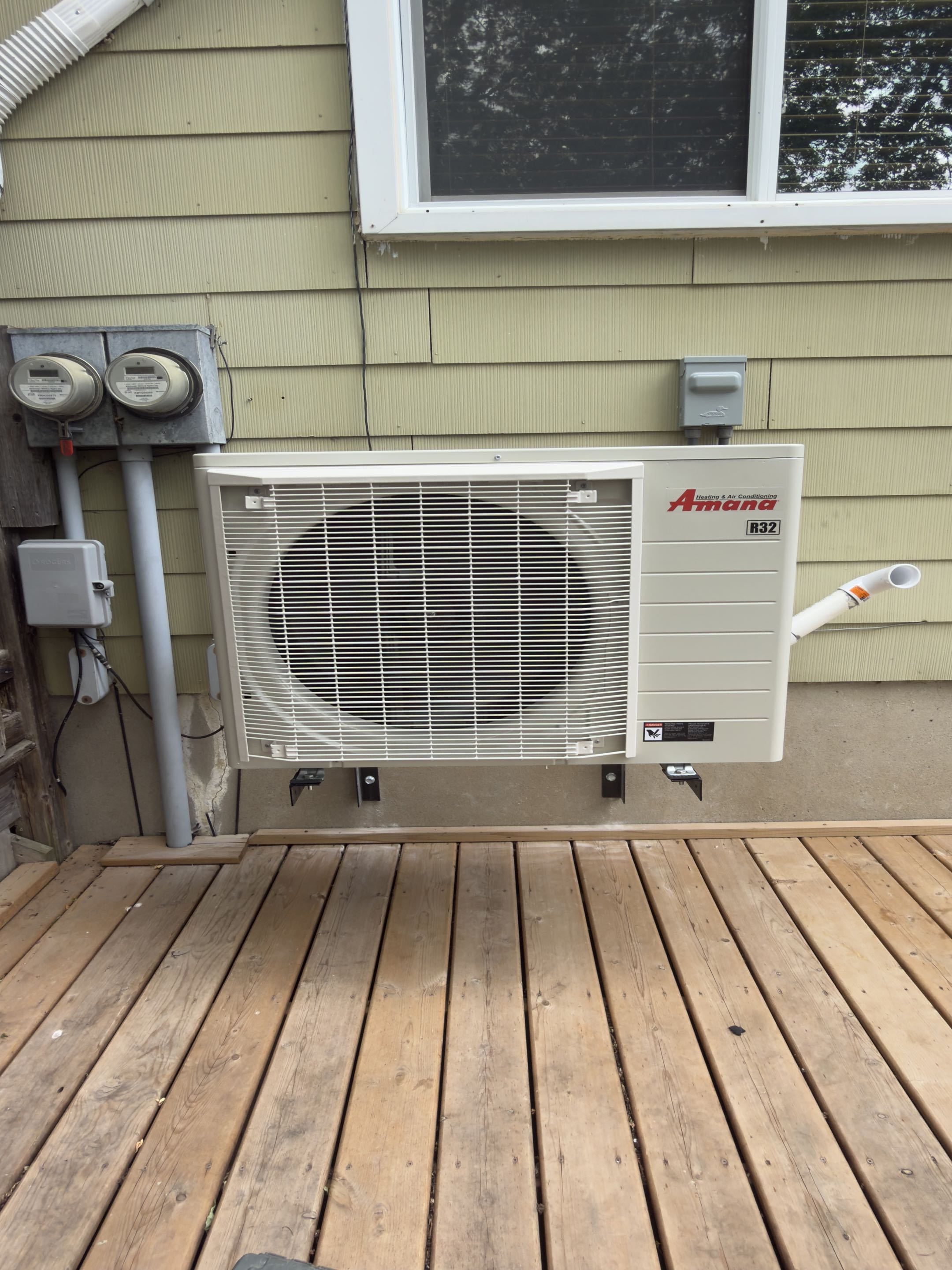 Completing an Amana furnace and heat pump for a family in New Hamburg 