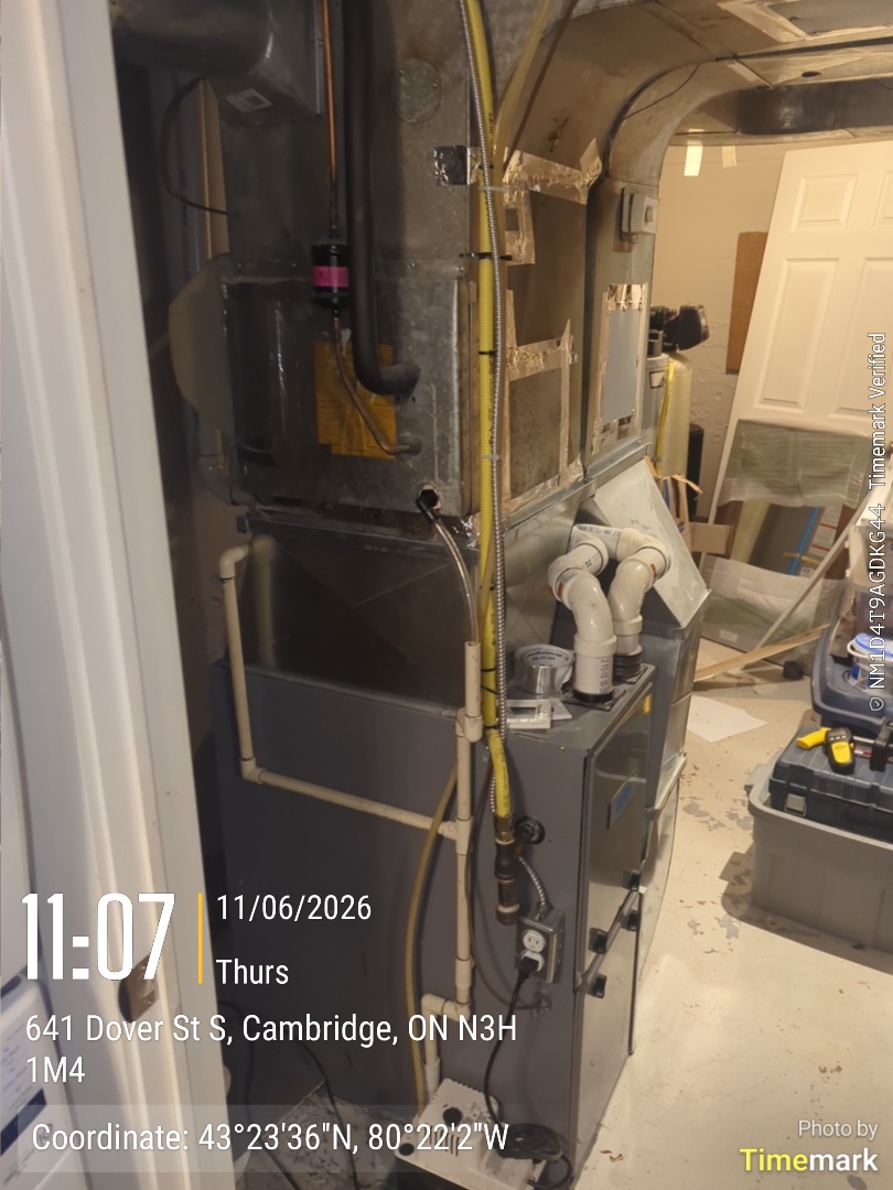 water found on floor near furnace, obstructed drain tube