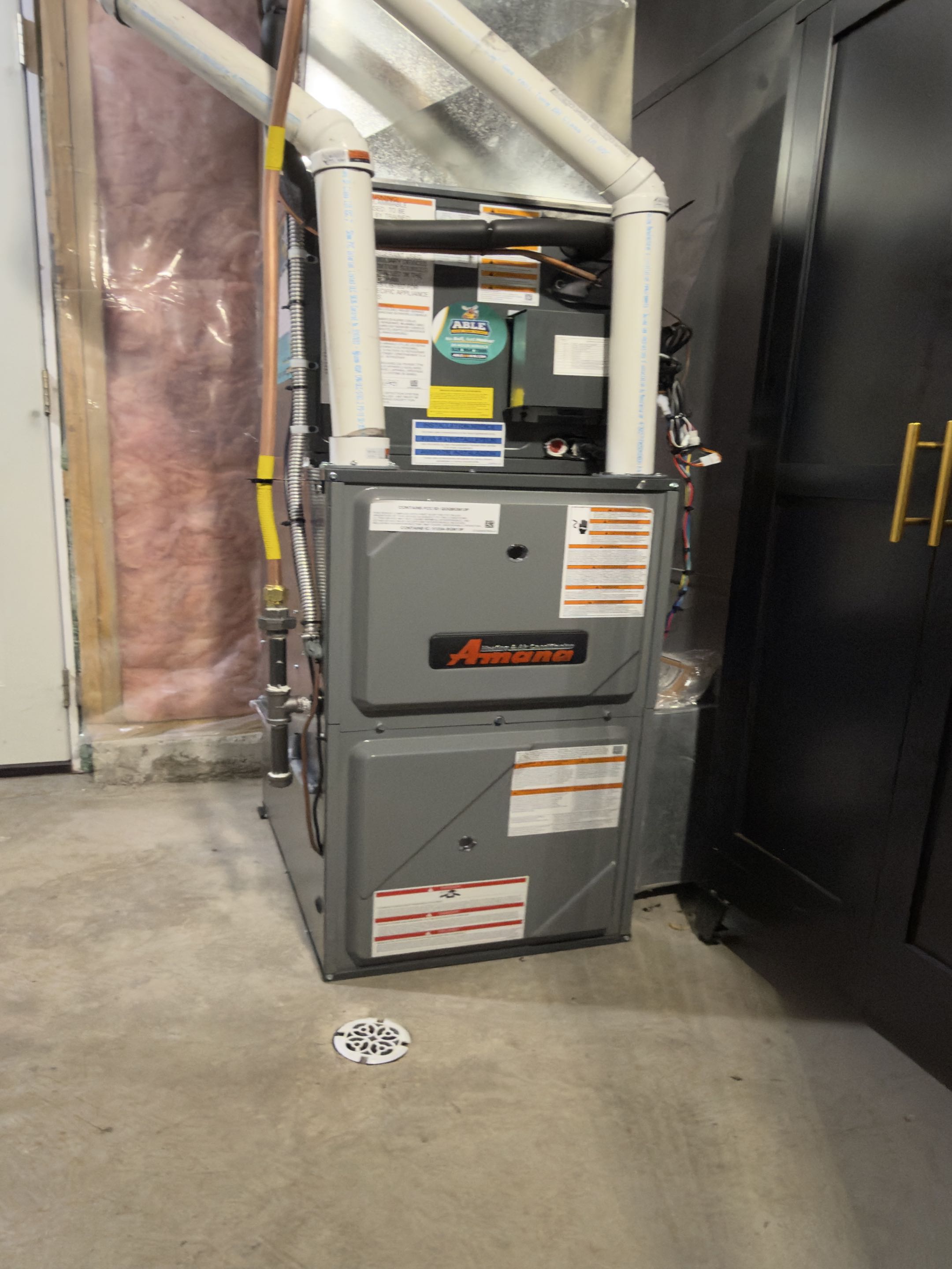 New Amana Heat Pump and furnace installation for a family in Waterloo