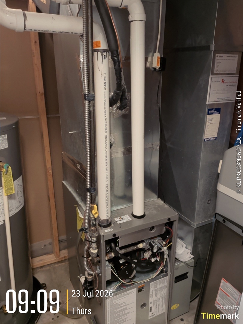 Completing a furnace and AC tune-up for a customer in Guelph
