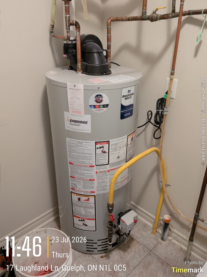 Completing a Bradford White water heater inspection for a family in Guelph

