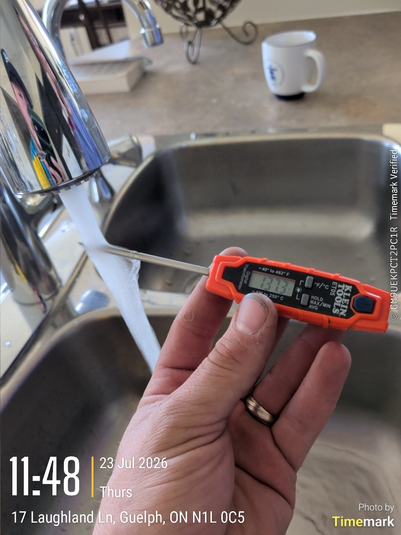 Completing a Bradford White water heater inspection for a family in Guelph

