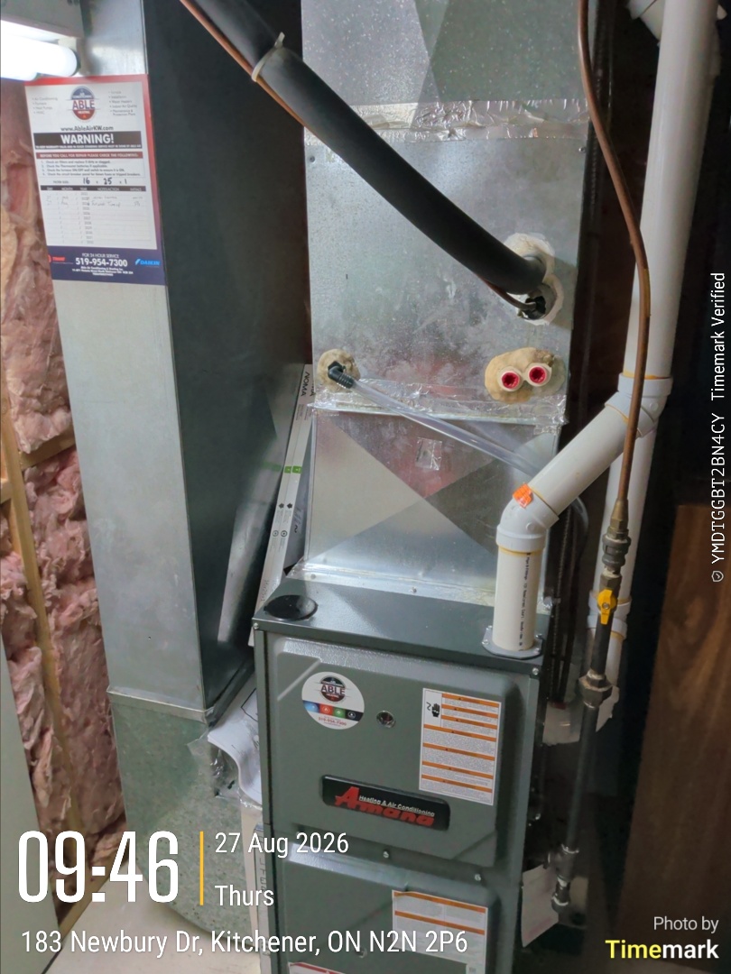 Completing an Amana furnace and Kinghome AC tune-up for a customer in Kitchener 