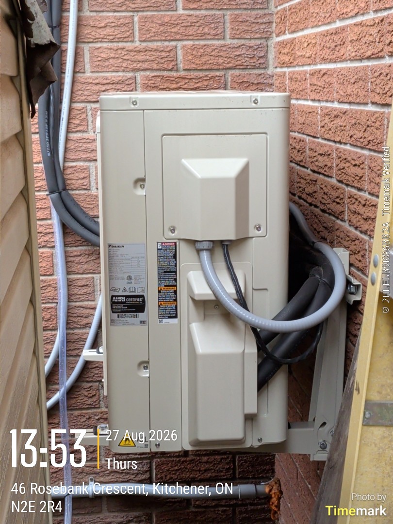 Completing a Daikin Heat Pump tune up for a customer in Kitchener