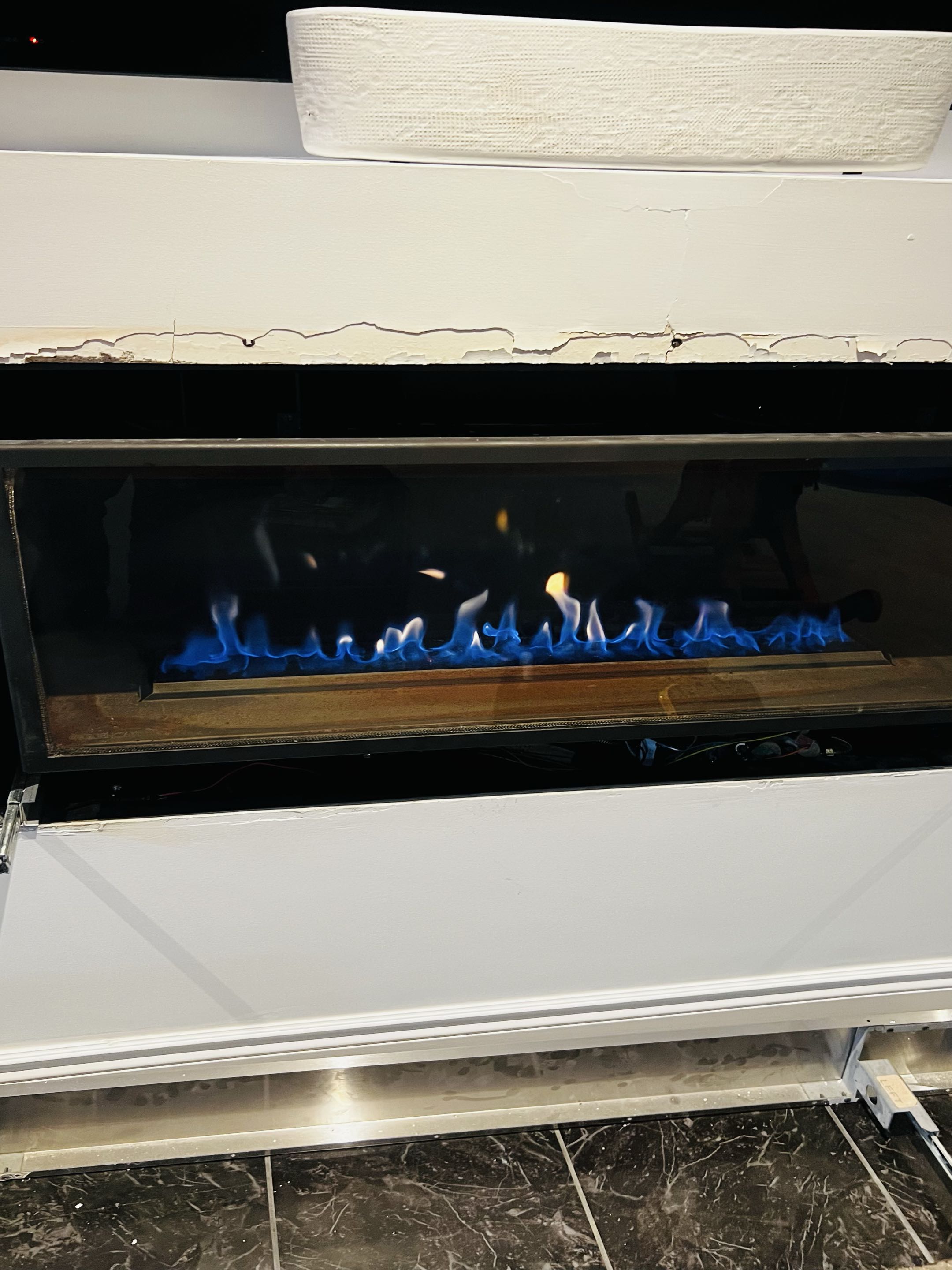 Completed an AC tune-up and fireplace service today. Cleaned the dirty outdoor coil and fireplace ignition assembly. Both systems are now working well.