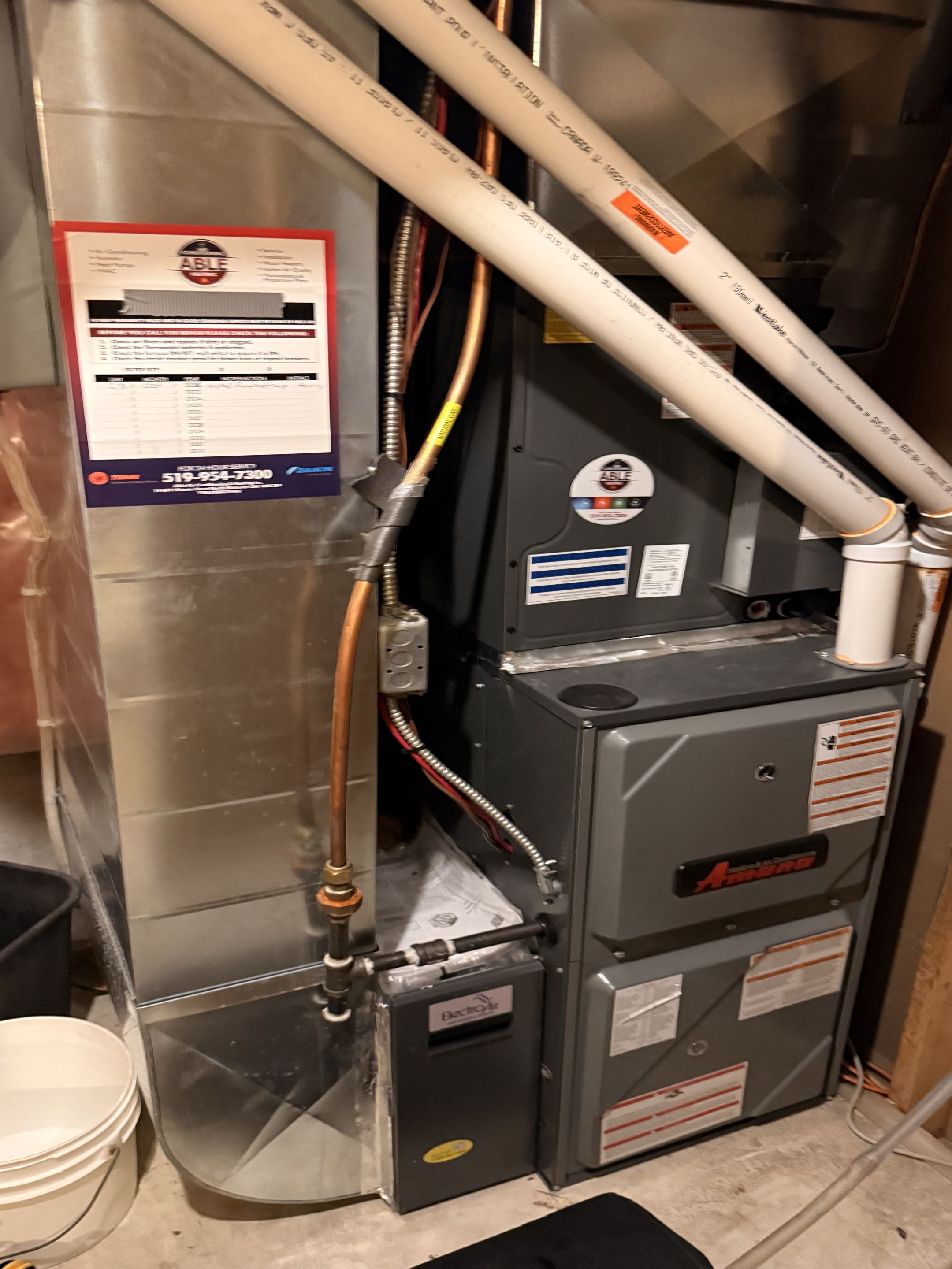 Completed a furnace and AC tune-up. Cleaned the outdoor coil and verified both systems are operating normally. Recommended replacing the dirty furnace filter and rinsing the outdoor coil before next summer.