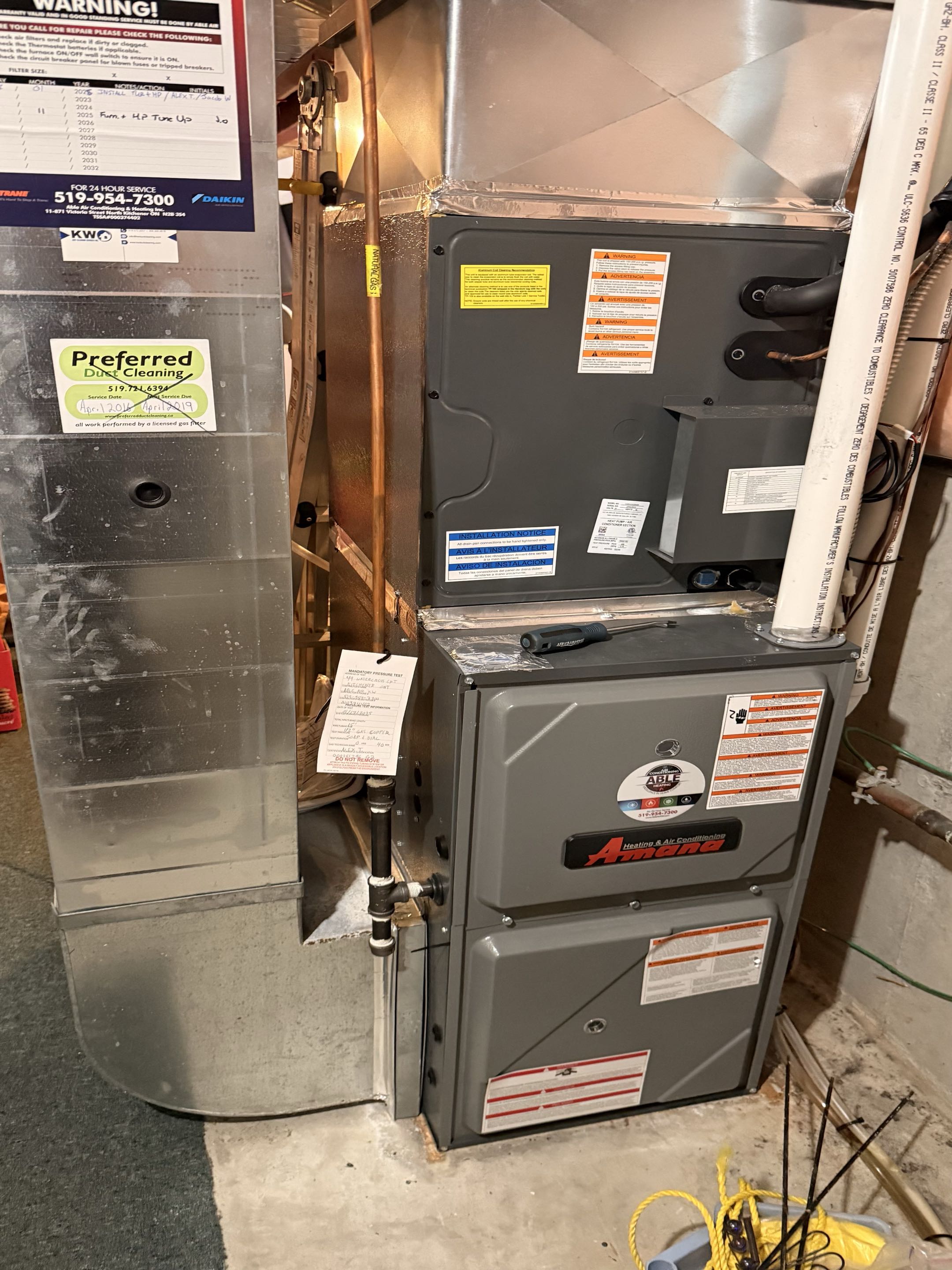 Completed a heat pump and furnace tune-up. Checked gas pressures, refrigerant readings, and temperature differences. Both systems were operating normally upon completion. Noted dirty ductwork and recommended professional duct cleaning to remove accumulated dust and debris.