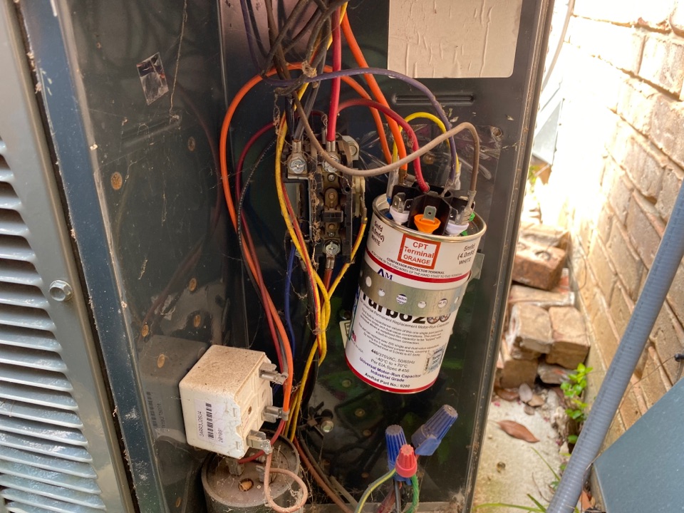 Colleyville, TX - A homeowner in Colleyville called for ac repair complaining that his air conditioner was blowing but not cooling. We arrived to find an 11 year old Trane AC condenser where the fan motor was not turning. Upon further investigation we found that the condenser capacitor was out of range. We replaced with a turbo 200 that has a 5-year warranty and the unit ran as designed. Left system cooling and operational. Colleyville, TX - A homeowner in Colleyville called for ac repair complaining that his air conditioner was blowing but not cooling. We arrived to find an 11 year old Trane AC condenser where the fan motor was not turning. Upon further investigation we found that the condenser capacitor was out of range. We replaced with a turbo 200 that has a 5-year warranty and the unit ran as designed. Left system cooling and operational.
