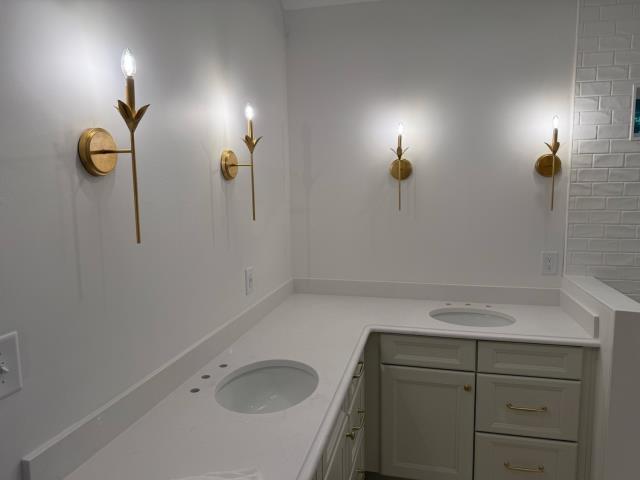 Raleigh, NC - Bathroom remodel with new vanity lights, recess lighting, receptacles and switches Raleigh, NC - Bathroom remodel with new vanity lights, recess lighting, receptacles and switches
