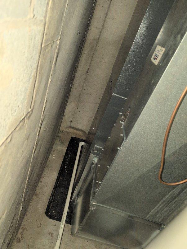 Sealed the return air drop connection where a 2"x2" hole was identified on the back side of the return air drop to the furnace. Applied appropriate sealing materials to ensure proper system operation and prevent air leakage. Inspection photos confirm complete sealing of the compromised area in the ductwork.