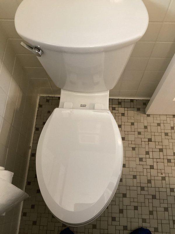 Successfully installed new American Standard toilet in customer's bathroom, replacing previous fixture. Properly secured toilet to floor with appropriate sealing and ensured proper function with test flush. Installation completed within quoted 2-hour timeframe.