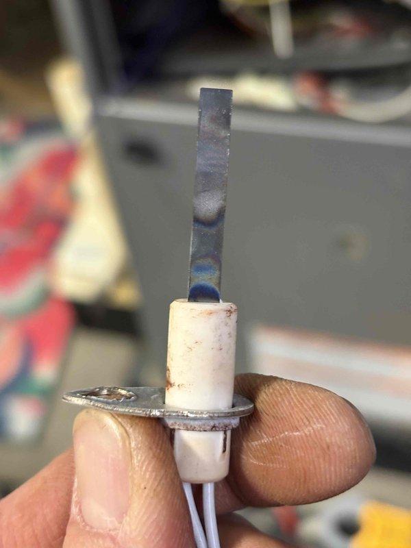 Performed annual furnace tune-up on 8-year-old Napoleon system. Discovered significant corrosion on burner assembly and heat discoloration on flame sensor electrode. Cleaned and tested components, but recommend monitoring system closely as these components may require replacement soon due to deterioration.