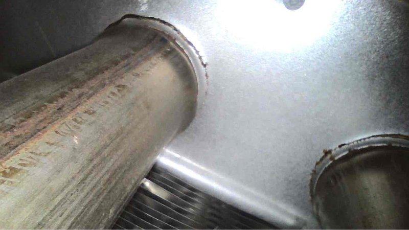 Performed annual heating tune-up on 16-year-old furnace. Discovered significant corrosion issues with standing water and rust formation on the heat exchanger. Documented evidence of moisture damage affecting electrical components and metal surfaces throughout the system.
