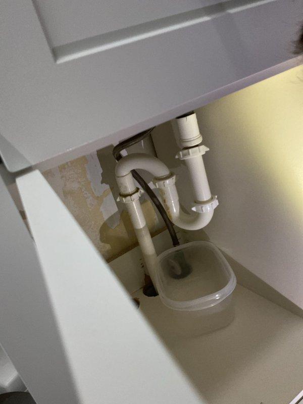 Responded to service call for bathroom drain that was repeatedly loosening and leaking. Inspected the P-trap assembly and discovered insufficient sealing at connection points. Disassembled drain components, cleaned mating surfaces, applied appropriate pipe sealant, and reassembled with proper torque to prevent future movement and water intrusion. Tested drain system functionality and verified watertight connections.