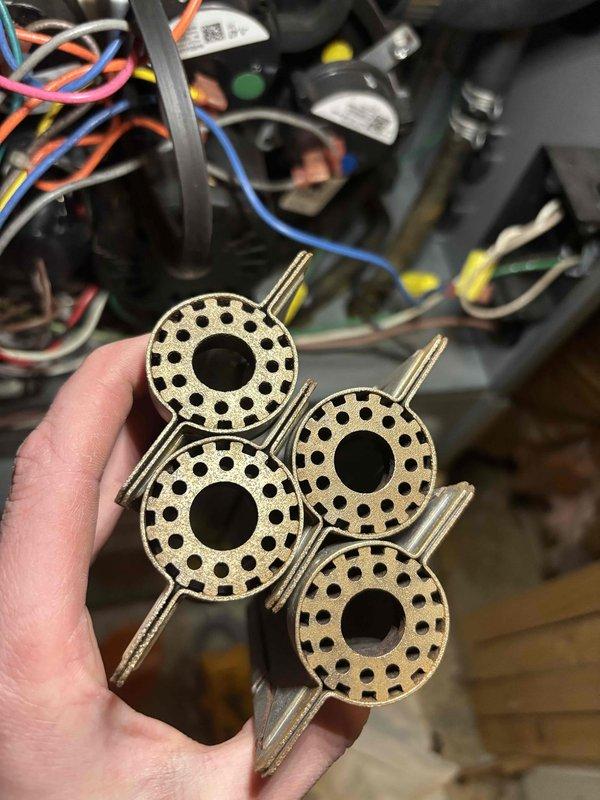 Performed annual maintenance on 12-year-old ENE furnace and humidifier. Removed and inspected four circular mounting brackets showing normal wear. All components were properly reinstalled and system operation verified to manufacturer specifications.