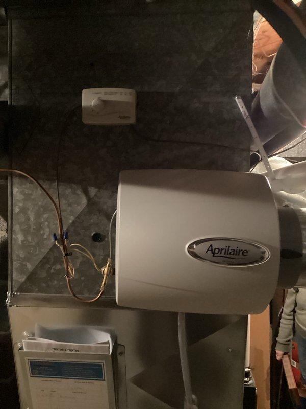 Completed annual humidifier service on Aprilaire whole-home humidification system. Inspected and replaced humidifier filter with new media pad as part of scheduled maintenance. System functioning properly after service with no issues identified.