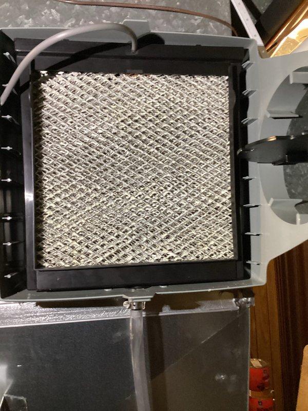 Completed annual humidifier service on Aprilaire whole-home humidification system. Inspected and replaced humidifier filter with new media pad as part of scheduled maintenance. System functioning properly after service with no issues identified.