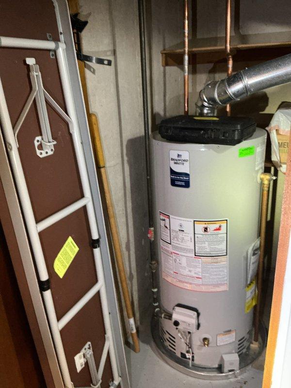 Responded to gas leak concern following previous furnace tune-up. Inspected 6-year-old water heater and furnace system with exhaust ventilation. No active leak detected; verified proper operation and safe gas levels throughout system.