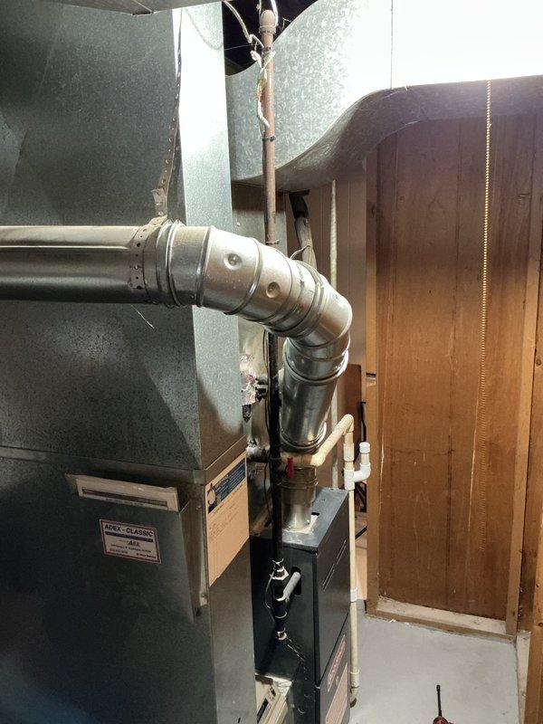Responded to gas leak concern following previous furnace tune-up. Inspected 6-year-old water heater and furnace system with exhaust ventilation. No active leak detected; verified proper operation and safe gas levels throughout system.