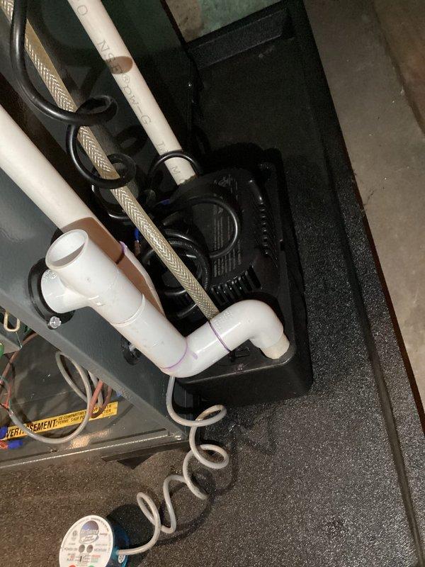 Performed annual heating maintenance on 1-year-old EnergiAir furnace (Model: WT 05-2033). Inspected plumbing components, sump pump system, and electrical connections. No issues detected during the comprehensive tune-up service.