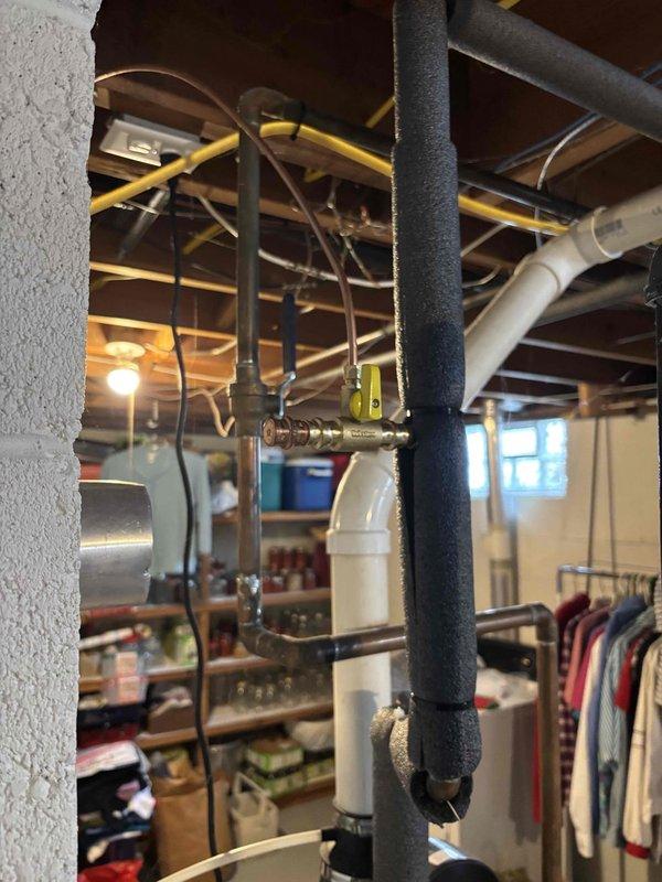 Successfully installed an Aprilaire 600 Manual humidifier on customer's HVAC system in basement. Unit was properly mounted to the furnace with galvanized ductwork connections and wired to the wall-mounted humidistat. Completed necessary plumbing connections to water supply line using copper fittings and insulated piping per manufacturer specifications.