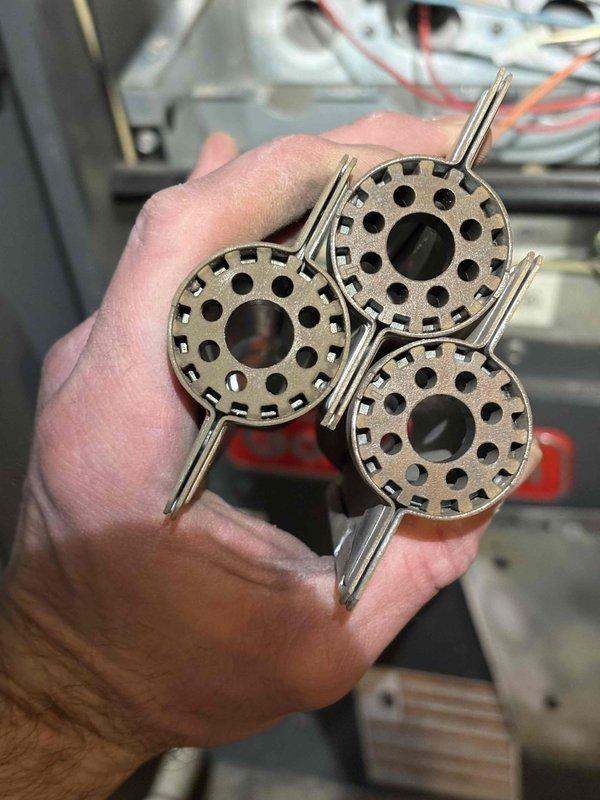 Performed comprehensive furnace tune-up on aging unit. Inspected and replaced deteriorated igniter assembly showing signs of corrosion. Also removed and replaced damaged flame sensor components which exhibited wear on contact points. System now operating at proper efficiency.