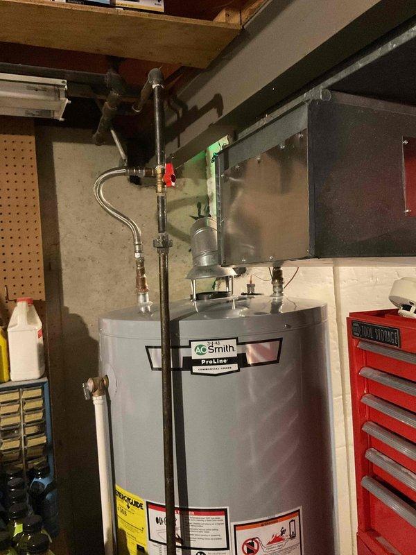 Successfully installed a powered anode rod in the customer's A.O. Smith ProLine water heater as quoted. The installation was completed without complications in the basement utility area where the water heater is located adjacent to the HVAC system.