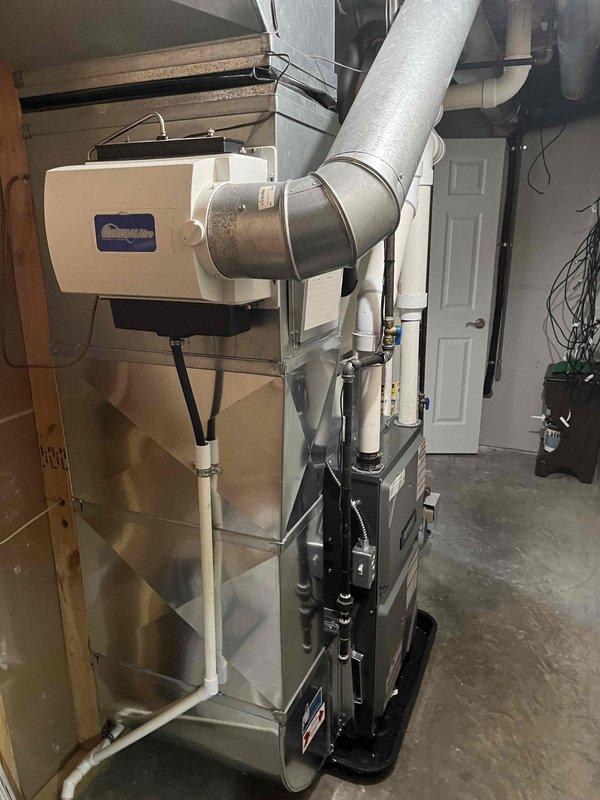 Successfully installed new high-efficiency furnace with proper PVC ventilation piping. Integrated system with existing ductwork and installed compatible humidifier. All connections verified and system tested for optimal performance.
