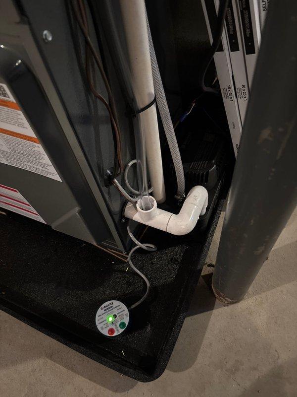 Successfully completed full system installation, replacing existing equipment with new Trane outdoor AC unit and furnace. Installed unit on concrete pad with proper electrical disconnect and refrigerant line connections. System includes appropriate condensate drainage with PVC piping. Water heater replacement was also completed as part of the comprehensive HVAC upgrade.