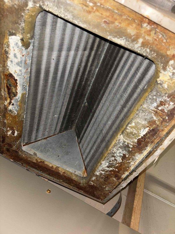 Successfully completed installation of new Carrier furnace unit with complete ductwork connection. Replaced severely corroded and deteriorated venting system, installing new metal ductwork with proper sealing at all joints. System was fully tested and is now operating at optimal efficiency.