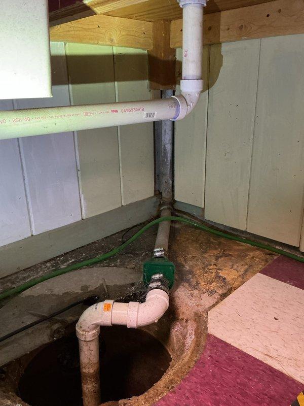 Responded to service call for continuously running sump pump with empty basin. Inspection revealed significant corrosion and scale buildup on pump components and check valve failure causing water to backflow into basin, triggering constant pump operation. Replaced check valve, cleaned pump assembly, and verified proper operation with normal cycling.