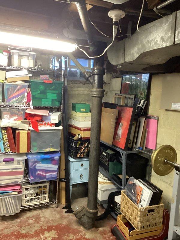 Responded to a plumbing leak service call where water was leaking from bathroom vanity into basement. Inspected the under-sink P-trap configuration and drainage system. Identified and repaired faulty compression fittings that were causing water to seep through and damage the basement ceiling below. Tested system after repair to confirm proper function with no further leakage.