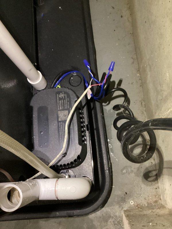 Performed annual heating maintenance on furnace and humidifier per client request. Inspected condensate drainage system and pump assembly, noting proper operation of the PVC drain lines. Verified electrical connections and control unit functionality, with all components operating within specifications.