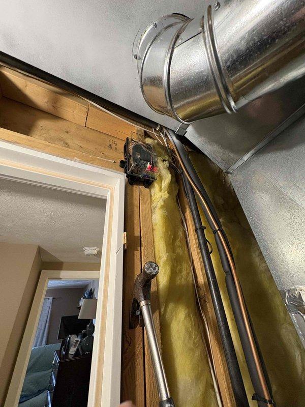 Completed installation of new AC system with same-day service. Installed outdoor condenser unit on concrete pad with proper electrical connections and refrigerant lines. Interior work included connecting to existing ductwork and ensuring proper wall penetration for line set, with all insulation properly restored.