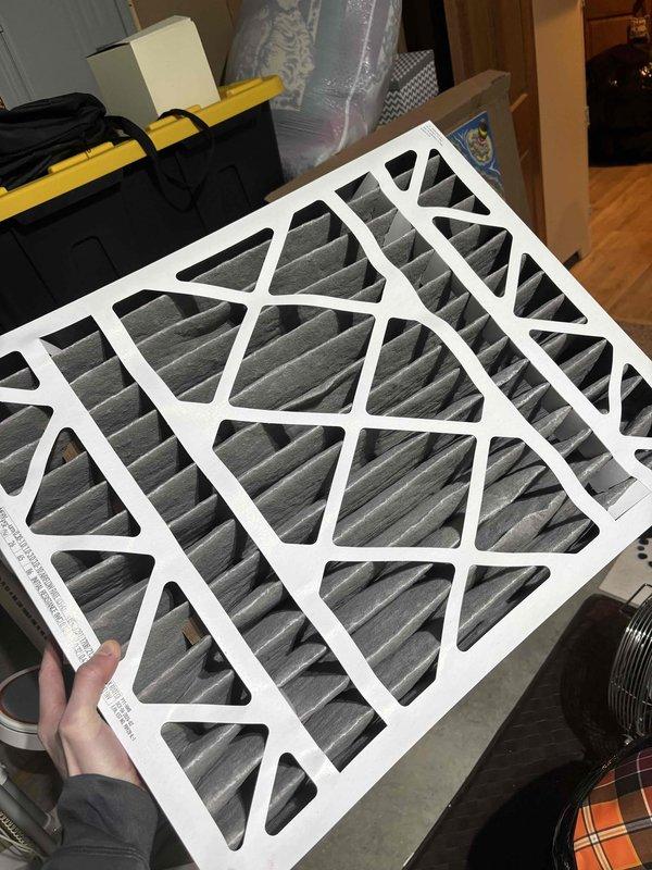 Completed annual heating maintenance on 7-year-old Goodman furnace. Replaced air filter with new pleated carbon filter and inspected blower wheel assembly components for proper operation. System is functioning correctly with no issues identified.