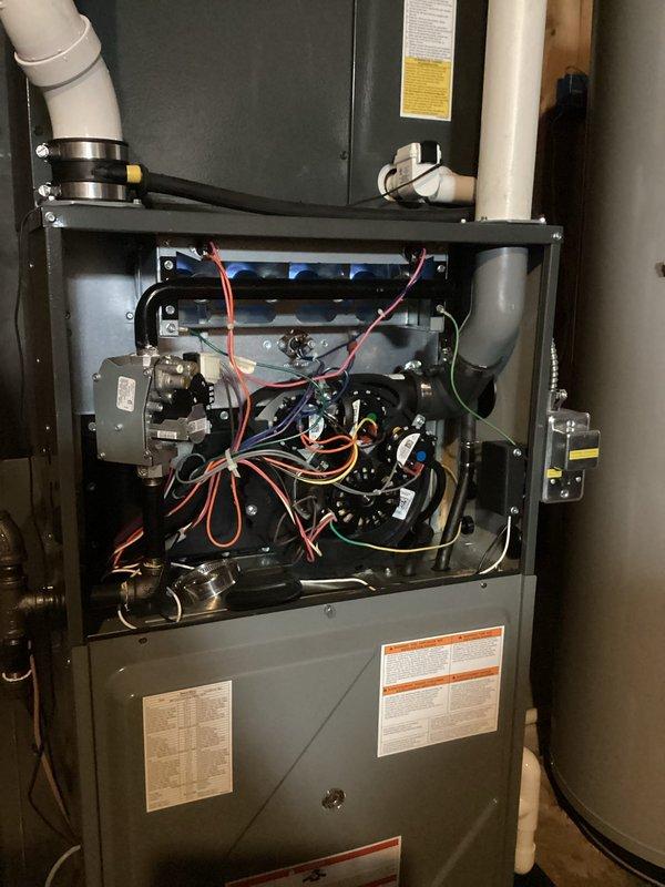 Performed annual heating maintenance and humidifier tune-up on residential HVAC system, which included a comprehensive inspection of the furnace's internal components, gas valve, heat exchanger, and electrical connections. All systems were found to be in proper working condition with no visible damage or deterioration to the furnace unit, air handler, or associated PVC piping and ductwork.