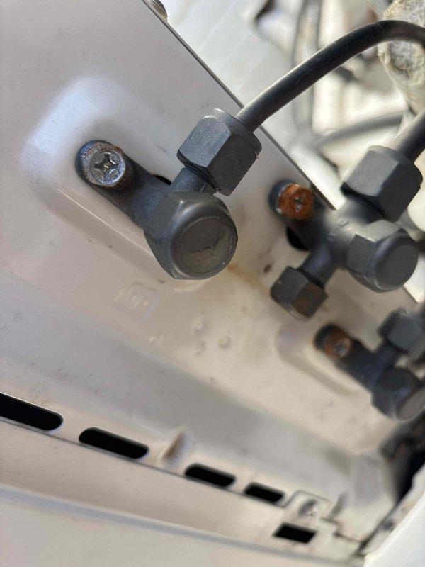 Responded to NH service call for mini-split system with ongoing operational issues. Performed diagnostic inspection of refrigerant lines and service ports, noting signs of minor corrosion around valve fittings. Evaluated indoor unit installation and assessed overall system condition to determine appropriate repair solution after previous contractor communication issues.