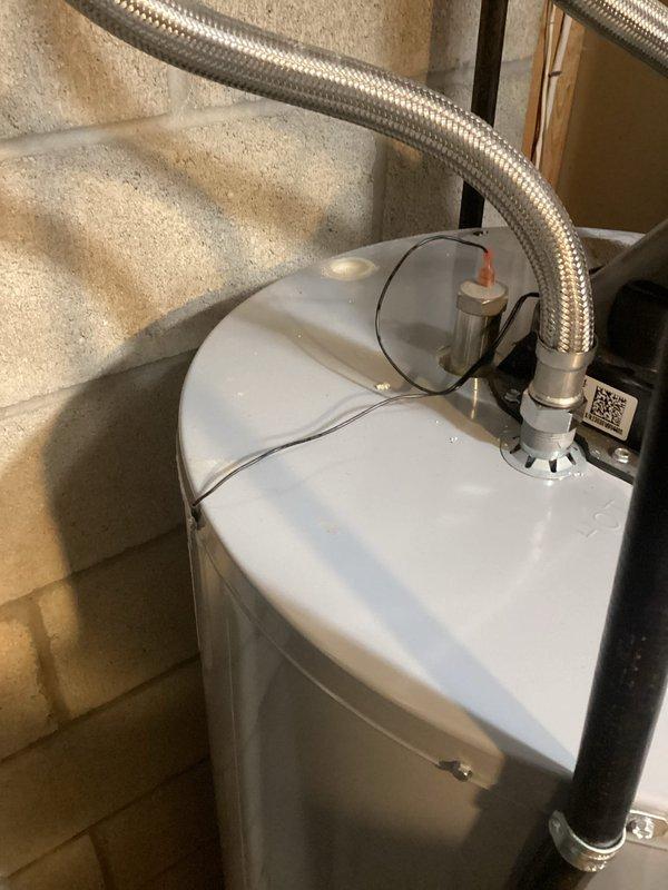 Successfully installed powered anode rod in customer's water heater. Connected electrical components properly and verified system functionality with digital testing equipment. No leaks observed at connection points.