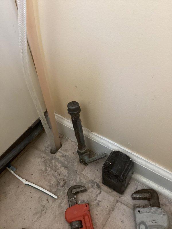 Installed new condensate drainage system, connecting main pipe to existing plumbing infrastructure. Positioned and secured vertical discharge pipe with appropriate fittings in utility area. System was tested and verified to be functioning properly with no leaks observed.