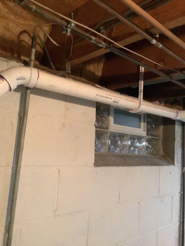 Successfully completed replacement of 20 feet of kitchen drain line in basement area. Installed new PVC drain pipe with proper support brackets attached to ceiling joists. All connections were properly secured and system was tested to ensure proper drainage function.