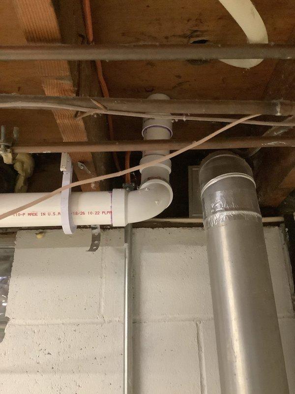 Successfully completed replacement of 20 feet of kitchen drain line in basement area. Installed new PVC drain pipe with proper support brackets attached to ceiling joists. All connections were properly secured and system was tested to ensure proper drainage function.