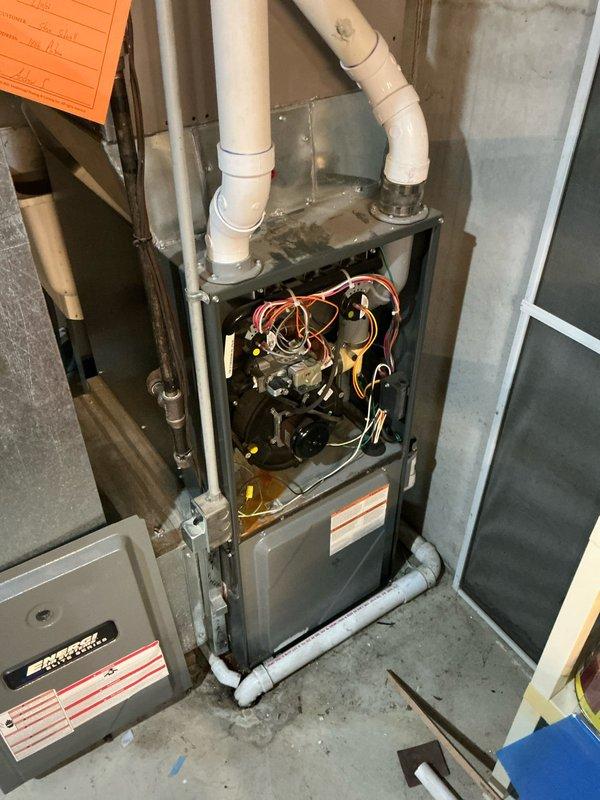 Responded to service call for furnace with ignition lockout. Diagnosed failed heat exchanger during inspection of residential HVAC system. Provided customer with estimate for replacement furnace unit after documenting current installation configuration and surrounding utility area connections.