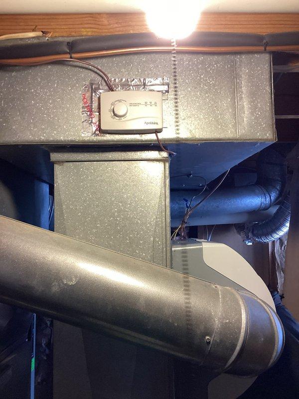 Successfully installed an Aprilaire humidifier unit to the existing HVAC system, connecting it to the metal ductwork and completing all necessary wiring. Control unit was properly mounted and calibrated for optimal humidity management. Note: Will return to install Manual Humid as per service plan.