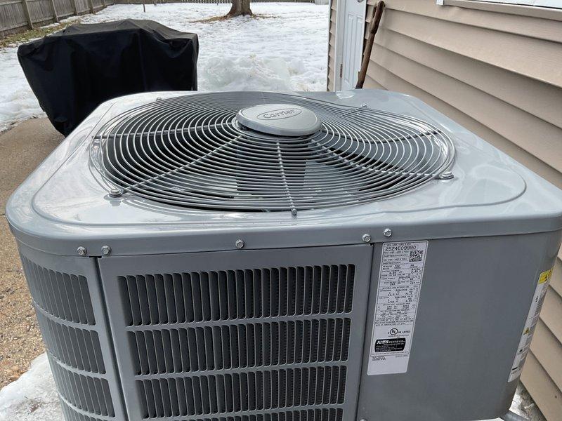 Responded to service call for a Carrier WT-8-2034 outdoor condensing unit (2 years old) that sustained damage from ice falling off the roof. Performed visual inspection of the unit, which appears externally intact with no immediately visible damage to the cabinet, fan assembly, or refrigerant lines. Recommended further diagnostic testing to assess potential internal damage to compressor or electrical components.